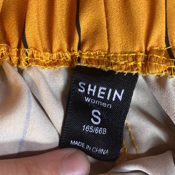 These are SHEIN high waisted tie shorts. They are a soft fabric and really flowy - Picture 2 of 2